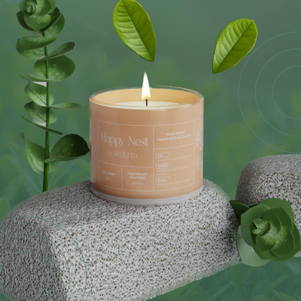 Product page for a candle labeled 'Happy Nest' on a website with a green background.
